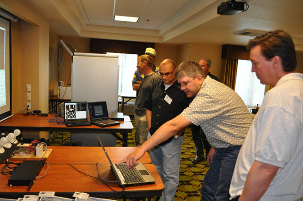 Sean Campbell explains the remote power controller at the Western States Forum. Sean Campbell, conducting a demonstration at the Western States Forum