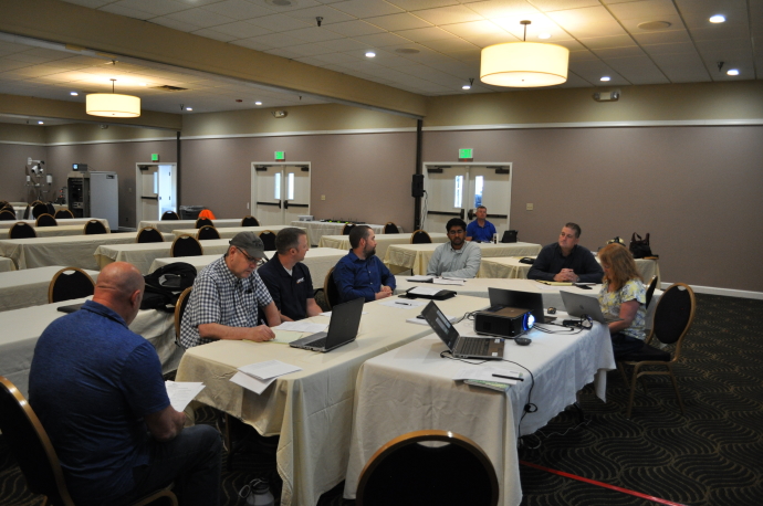 WSRTC Steering Committee Annual Meeting 2021 Group of people around tables; clockwise from left, Jim Whalen, Sean Campbell, Tyler Laing, Jeremiah Pearce, Karthik Murthy, Tony Leingang, Leann Koon