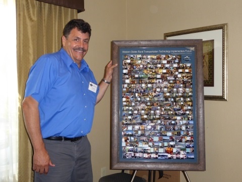 Ian Turnbull is a founder of the Western States Forum. In recognition of his efforts, when he retired he was presented with a framed collage depicting the Forum over the past ten years. 
	Photo by Leann Koon.