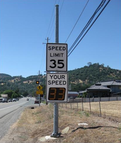 Permanent mount radar speed sign along a stretch of highway where the posted speed limit is 35 miles per hour. Permanent mount radar speed sign along a stretch of highway where the posted speed limit is 35 miles per hour.