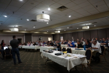 Numerous participants raise their hands to ask questions and engage in ODOT's technical presentation during the 2019 Western States Forum.