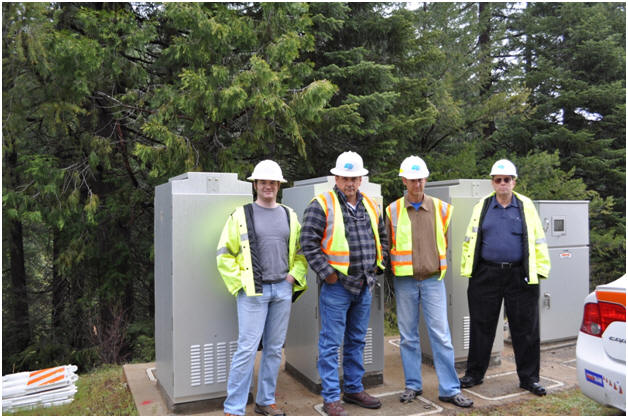 Kelvin Bateman, Ian Turnbull, Dan Richter and Ken Beals in front of the ITS cabinets at Spring Garden.