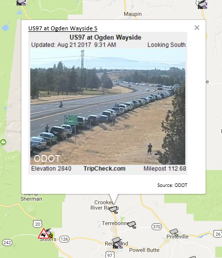 Long line of cars parked along US 97 at Ogden Wayside, between Redmond and Madras, Oregon. Long line of cars parked along US 97 at Ogden Wayside, between Redmond and Madras, Oregon.