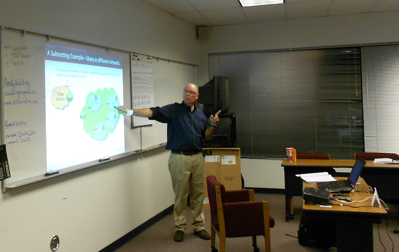 Course instructor Andy Walding explains a subnetting example of users in different networks.