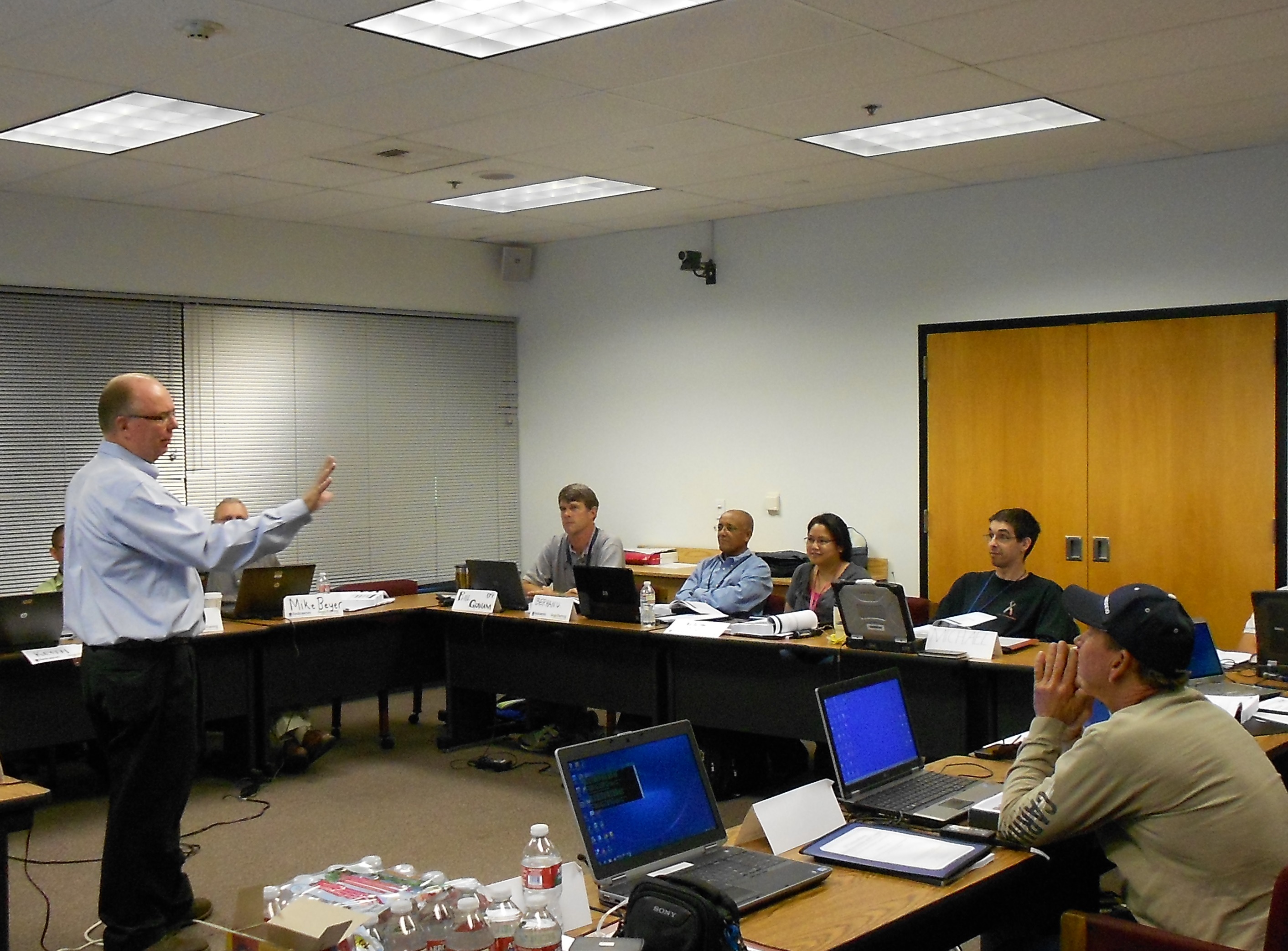 Instructor Andrew Walding responds to a question from a student during the IP Fundamentals course.