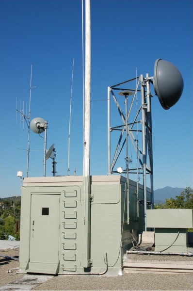This equipment is located on top of District 2 Headquarters. The antenna on the right is pointed at Bass Mountain to the north of Redding. This equipment is located on top of District 2 Headquarters. The antenna on the right is pointed at Bass Mountain to the north of Redding.