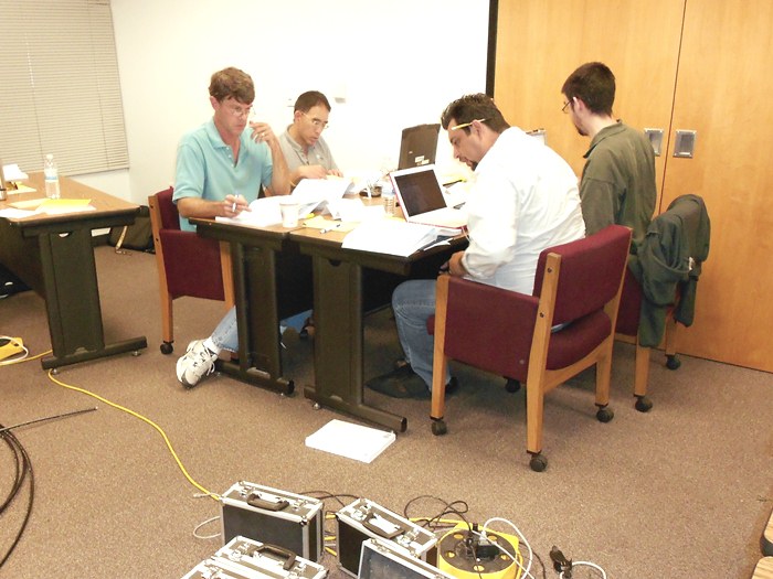 One team works through the design problem.  Pictured clockwise from front left:  Phil Graham (District 9), Steven Gee (District 5), Michael Mullen (District 3), Luis Torres (District 10).