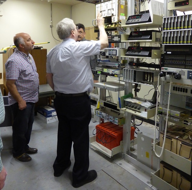 Clockwise from left: Ihab Elzaanoun (Caltrans District 6), Ian Turnbull (Caltrans District 2), and instructor Scott Baxter in the radio equipment room at the Woodland Maintenance Yard. Clockwise from left: Ihab Elzaanoun (Caltrans District 6), Ian Turnbull (Caltrans District 2), and instructor Scott Baxter in the radio equipment room at the Woodland Maintenance Yard.