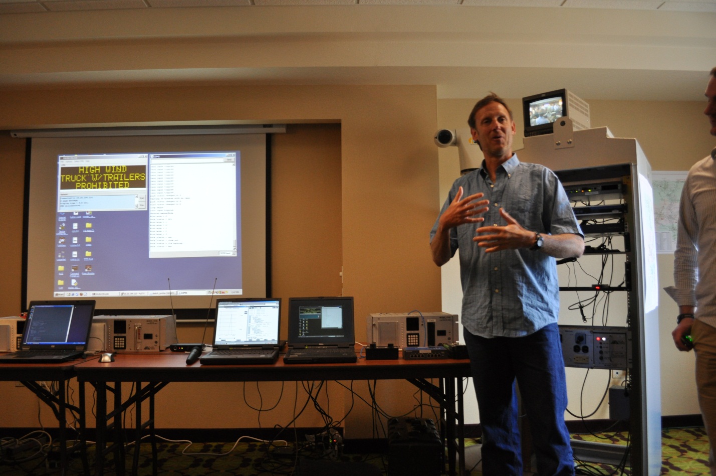 Dan Richter from WTI demonstrates the Automated Safety Warning Controller at the 2010 Forum.