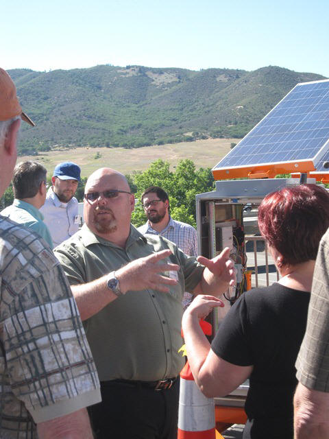 Jon Dickinson, Nevada DOT, demonstrates their mobile ITS hotspot trailer, a project developed after seeing a similar trailer at the 2008 Forum.