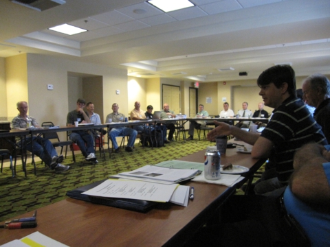 Questions and dialogue during technical presentations are a unique and important aspect of the Western States Forum. Here, Travis Swanston, a Software Engineer from the Advanced Highway Maintenance & Construction Technology Research Center at UC-Davis, asks Lynne Randolph a question about her experiences using Bluetooth technology for calculating travel times. (2012)