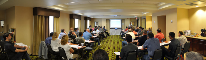 Participants at the 2013 Forum listen to a technical presentation.