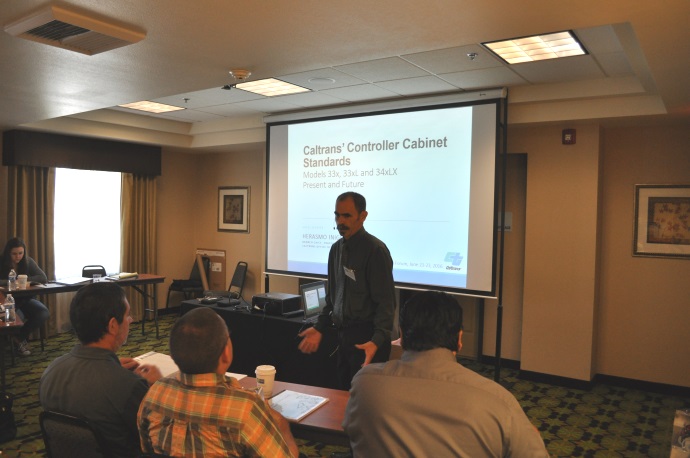 Herasmo Iniguez introduces his presentation on Caltrans’ controller cabinet standards. Herasmo Iniguez introduces his presentation on Caltrans’ controller cabinet standards.