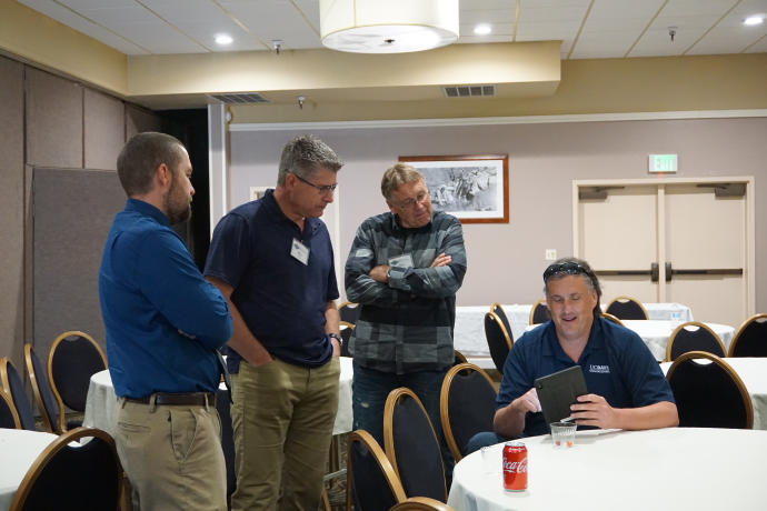 Stephen Donecker (right), UC Davis, demonstrates the portable Responder unit at the 2019 Western States Forum.