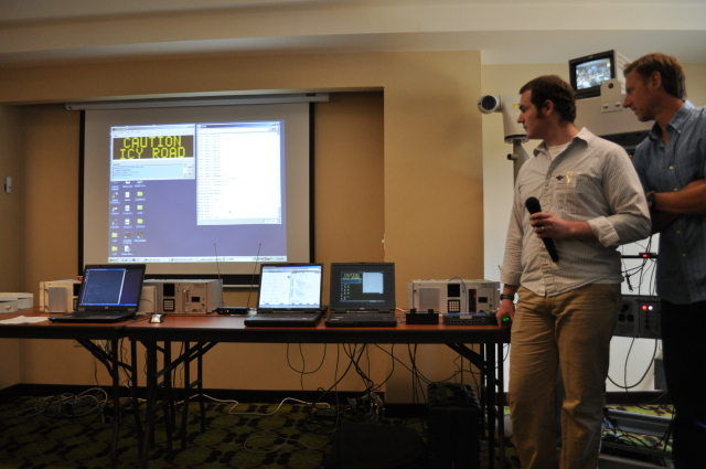 Kelvin Bateman (left) and Dan Richter (right) from the Western Transportation Institute included a demonstration on the Automated Safety Warning Controller system. Kelvin Bateman (left) and Dan Richter (right) from the Western Transportation Institute included a demonstration on the Automated Safety Warning Controller system.