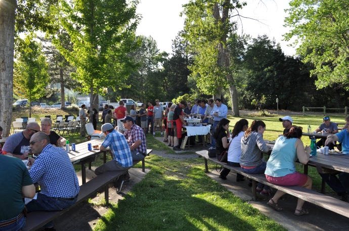 Forum participants network in the park during the Wednesday night BBQ. Forum participants network in the park during the Wednesday night BBQ.